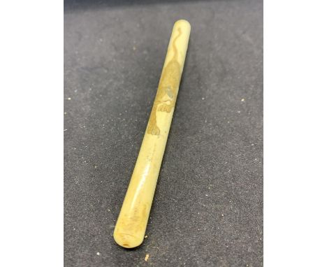 A VINTAGE BONE CHAROOT HOLDER CARVED WITH A TIGER 