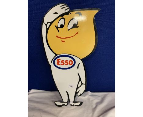 A METAL ESSO MAN CAVE/GARAGE SIGN 