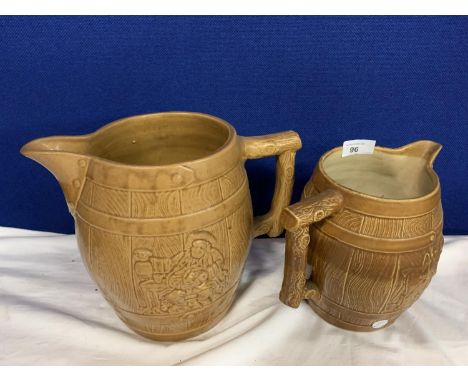 A PAIR OF LARGE BROWN CERAMIC JUGS WITH WORKING HORSE DESIGN 