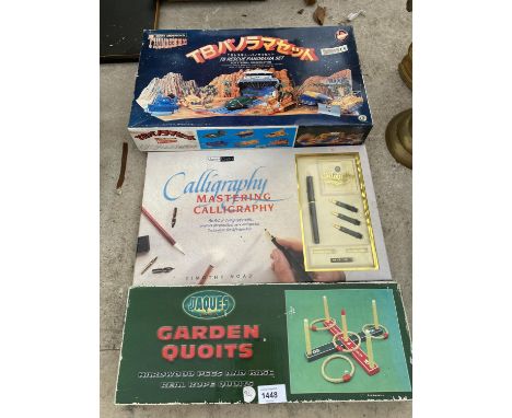 A THUNDERBIRDS SET, A CALLIGRAPHY SET AND A SET  OF GARDEN QUOITS 