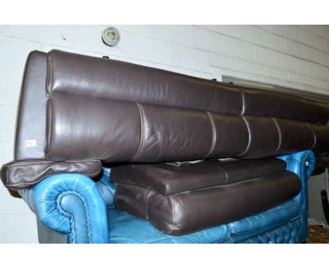 A BROWN LEATHER RECLINING LARGE TWO SEATER SOFA