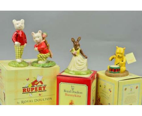 A BESWICK WARE LIMITED EDITION FIGURE 'Rupert with Satchel' No 1258/2000 (certificate), a boxed Royal Doulton 'Rupert and the