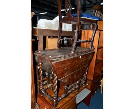 A LATE 18TH CENTURY OAK BARLEY TWIST GATE LEG TABLE, together with two Chippendale style chairs and four other chairs (sd) (7