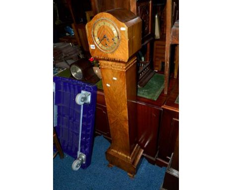 A WALNUT GRANDDAUGHTER CLOCK, approximate height 142cm, box containing a quantity of clock parts including three movements, c