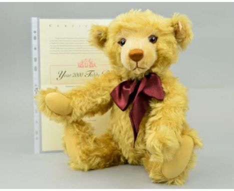 A BOXED LIMITED EDITION STEIFF 'YEAR 2000 TEDDY BEAR', limited edition No 8520, No 670374, blonde mohair, fully jointed, grow