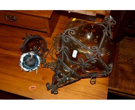 A METAL AND PRESSED COLOURED GLASS MOROCCAN STYLE CEILING LIGHT