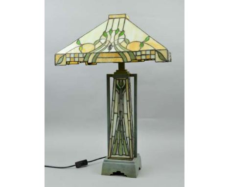 A LARGE TIFFANY STYLE TABLE LAMP, having square canopy shaped shade, central illuminated column, with metal supports and base