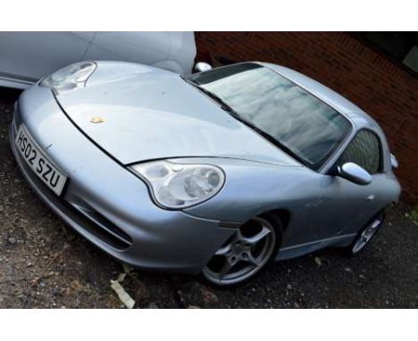 A 2002 PORSCHE 911 CARRERA 2996 CONVERTIBLE, in silver, unverified mileage shown 69547, V5C present, no MOT, Reg No HS02 SZU 