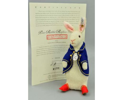 A BOXED LIMITED EDITION STEIFF 'PETER RABBIT REPLICA 1904/05', No 02100/3000, No 402180, wool plush, wearing navy felt jacket