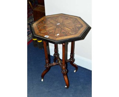 A VICTORIAN MULTI WOOD SPECIMEN MARQUETRY OCTAGONAL OCCASIONAL TABLE, on fluted uprights united by a cross stretcher, on whit