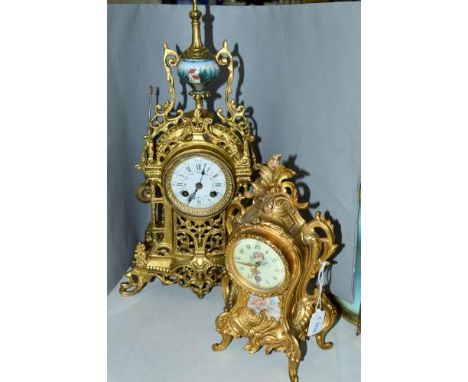 TWO GILT ROCOCO STYLE CLOCKS, to include a Smith's, Arabic dial with cherub decoration and the body ornately decorated, on a 