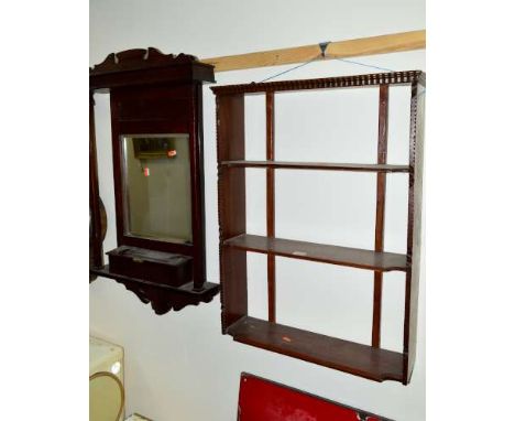 AN EDWARDIAN MAHOGANY THREE TIER WALL SHELF, and a mahogany bathroom mirror with a hinged compartment (2)