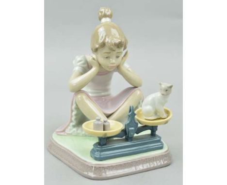 A LLADRO FIGURE GROUP, 'How You've Grown' No 5474, depicting young girl weighing cat, modelled by Regino Torrijos, approximat