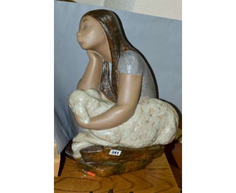A LARGE LLADRO GRES SCULPTURE, 'Shepherdess Sleeping' No 01012005, retired 1981, girl sitting on a rock holding a lamb, Lladr