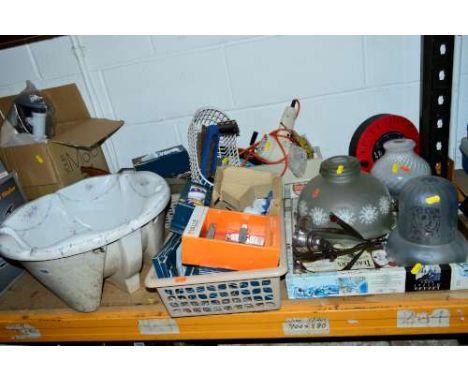 AN ORNATE BASIN, a box of fittings, various door furniture and three vintage light shades