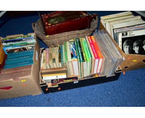 THREE BOXES AND A BASKET OF BOOKS, RECORDS AND 'MAXIM' WALL CLOCK, to include automobile manuals, 'Beatles' record and fishin