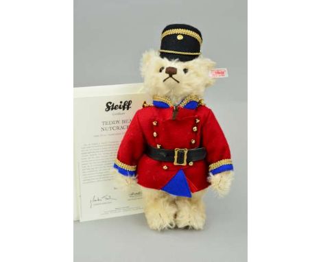 A BOXED LIMITED EDITION STEIFF TEDDY BEAR 'NUTCRACKER', No 76/3000 No 037269, white mohair wearing a uniform, inside the bear