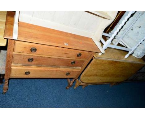 AN OAK CHEST OF THREE LONG DRAWERS, together with a light oak barley twist gate leg table (2)