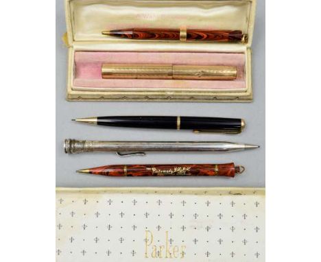 A SELECTION OF PENS AND PENCILS, to include an Eversharp fountain pen with 14k nib and engine turned case, a Waterman's retra