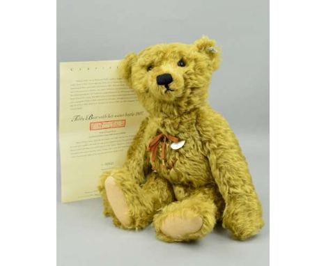 A BOXED LIMITED EDITION STEIFF 'TEDDY BEAR WITH HOT WATER BOTTLE 1907', No 02510/3000, No 406621, brass coloured mohair, his 