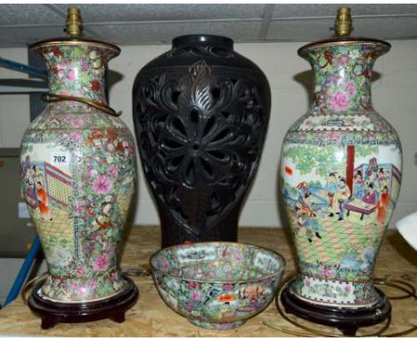 A PAIR OF CHINESE FAMILLE ROSE STORAGE JARS WITH LAMP FITTINGS, sitting on hardwood bases, height approximately 52cm, togethe