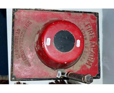 A CAST IRON WALL MOUNTED MANUAL FIRE ALARM, not tested as handle seized, made by E G Burnell & Sons Ltd, Gt Yarmouth