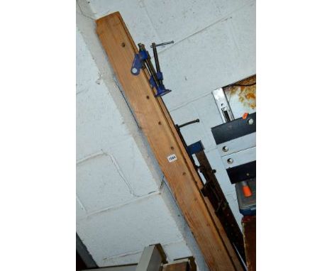 SIX SASH CLAMPS OF VARYING LENGTHS, a clamp and an axe