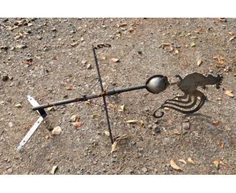 A CAST IRON AND BRASS WEATHER VANE, with a Rooster top ornamentation