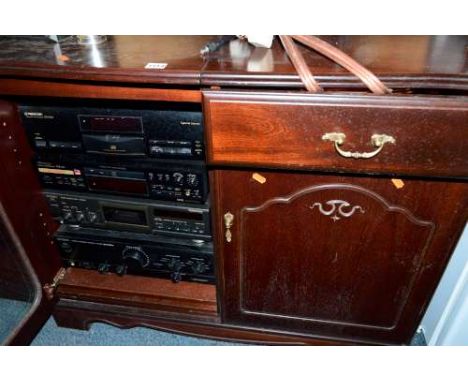 A HI FI CABINET, containing a NAD stereo turner 402, two Pioneer CD player, a Technics cassette player and a Kenwood amplifie