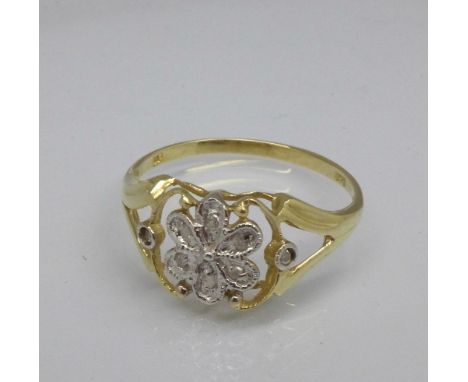 A 9ct gold and diamond ring, 1.2g, O