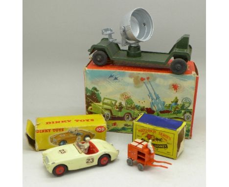 A Lone Star Mobile Fighting Unit, a Dinky Toys 109 Austin Healey 100 Sports and a Matchbox Forklift, all boxed