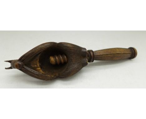 A Black Forest carved wooden nutcracker in the form of a squirrel, a/f