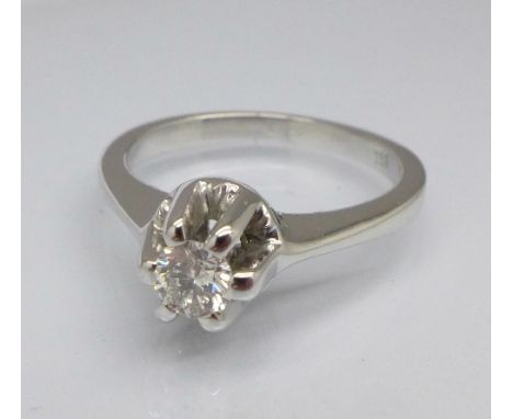 An 18ct white gold and diamond ring, over 0.25 carat diamond, weight, marked 750, 4.7g, O