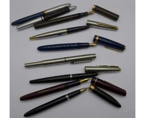 A Parker fountain pen with 14k gold nib, a Sheaffer pen with 14k gold nib, a Watermans, an Osmiroid and five other pens (9)