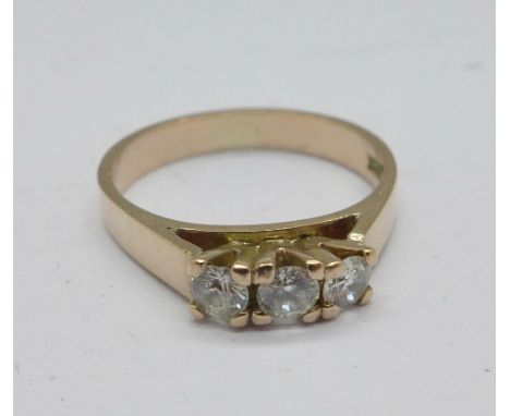 A 9ct gold and three stone ring, 2.4g, J