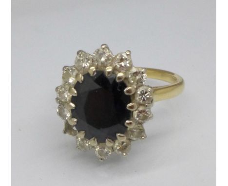 An 18ct gold, sapphire and diamond cluster ring, one stone missing, 5g, M