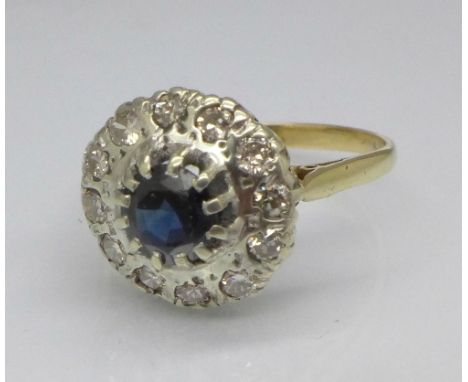 An 18ct gold, platinum, sapphire and diamond cluster ring, 3.1g, P