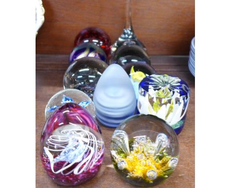 Eleven glass paperweights including Caithness, Selkirk and iridescent Maltese