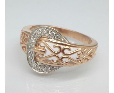 A silver gilt buckle ring, Q