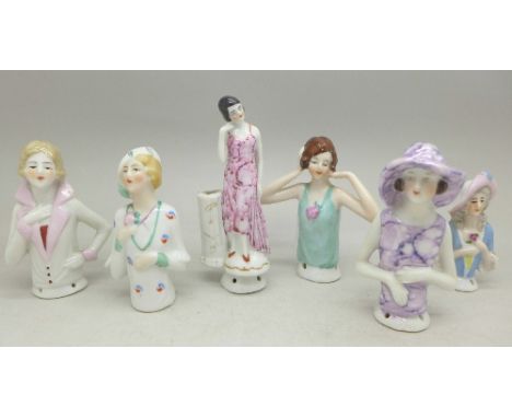 Six pin cushion dolls
