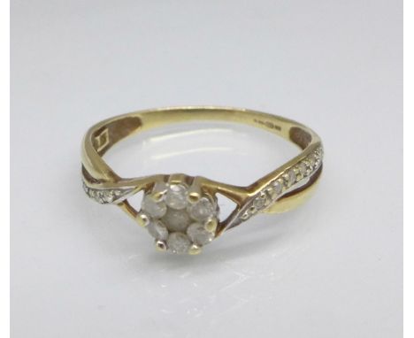 A 9ct gold and diamond ring, 1.1g, N