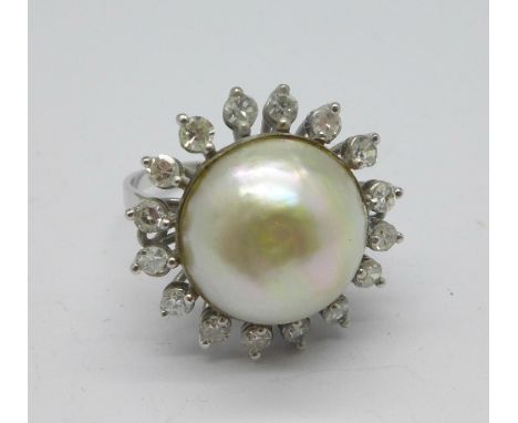 An 18ct white gold, diamond and pearl ring, marked 750, 6.9g, R