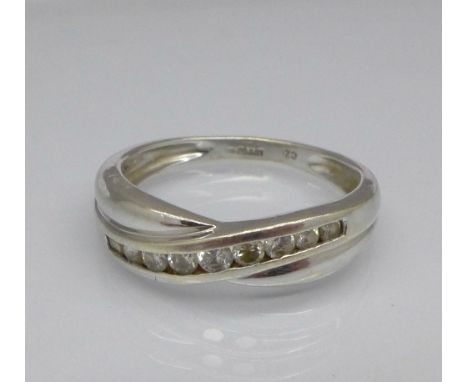 A 9ct white gold and cubic zirconia ring, 2.1g, M