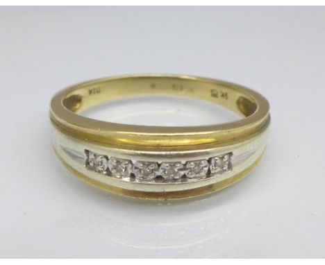 A 9ct gold and diamond ring, 3.6g, T