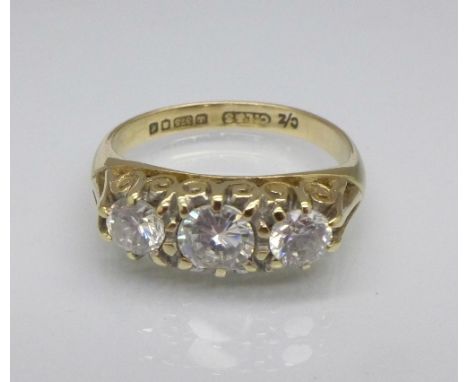 A 9ct gold and three stone ring, 2.1g, J