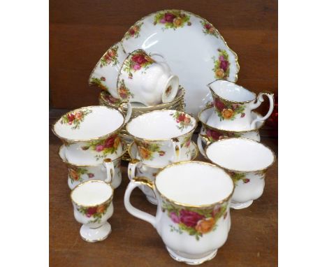 Royal Albert Old Country Roses teaware including seven cups, one a/f, eight saucers, six side plates cream and sugar, (26)