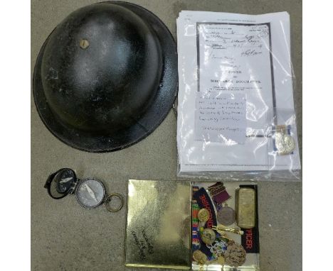 A WWI medal to 2997 Pte. W. MALLETT. SHER.RANGE. with army record, helmet, compass, badges and medallions