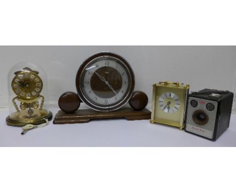 Three clocks including a Metamec mantel clock, an anniversary clock and a Kodak camera