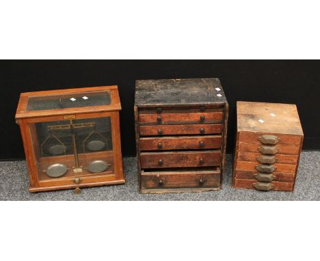 A pine table top collectors cabinet with six trays; another pine table top collectors cabinet and a cased River Cheimcal Ltd 