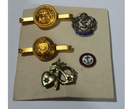 A Sterling silver and enamel Royal Navy badge; an anchor and heart badge; Great War Newfoundland Veterans badge; Royal Engine